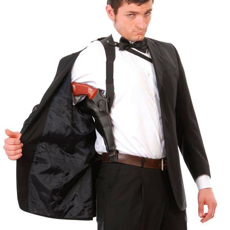 Erwachsener trägt schwarzes Schulterholster unter einem Sakko als Kostüm-Zubehör im Agenten-Look.