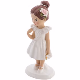 Figur Kommunion Mädchen im weißen Kleid mit goldenem Kreuz und brauner Hochsteckfrisur mit Blüte im Haar von der Seite.