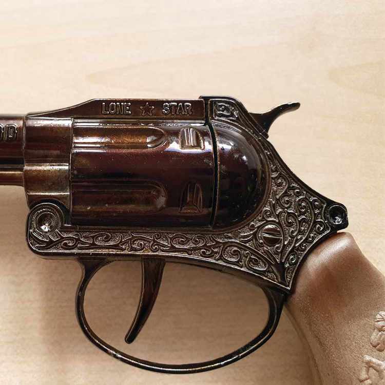 Sheriff Pistole Ramrod 17,8 cm Western 100 Schuss-Gewehr Cowboy Kostüm-Zubehör Fasching Karneval Rollenspiel Mottoparty Detailaufnahme Sheriff Pistole Ramrod von der Seite