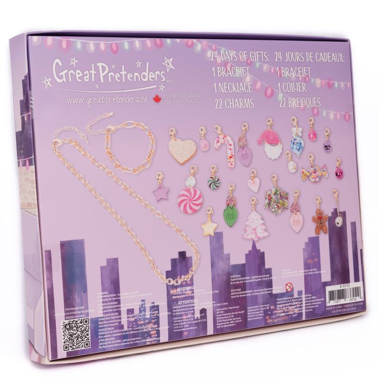 Schmuck Adventskalender Armband & Kette 22 Anhänger Weihnachts-Party für Kinder Adventskalender mit geöffnetem Türchen, davor die enthaltenen Schmuckteile dekorativ angeordnet.