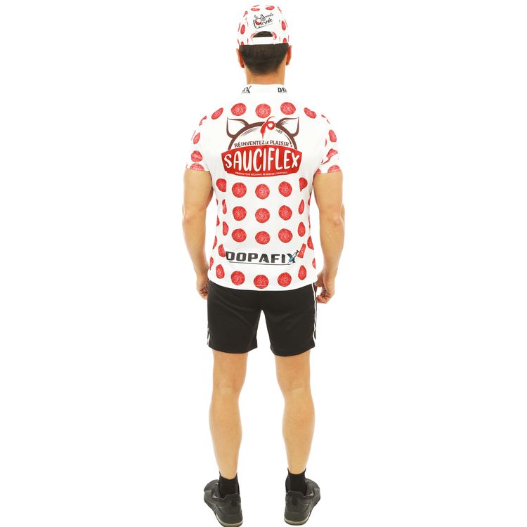 Mann im weißen, gepunkteten Radfahrer-Kostüm mit Mütze und Fahrrad.