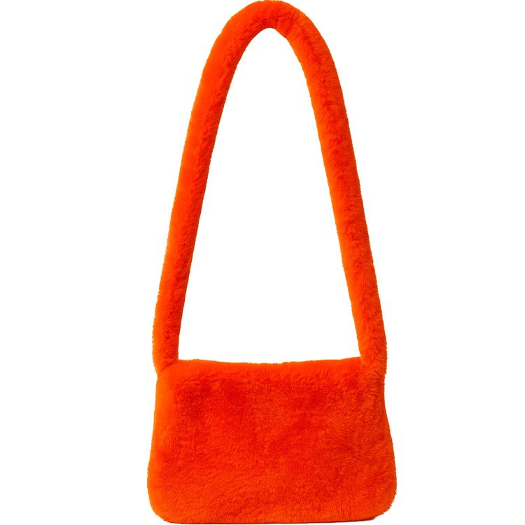 Plüschtasche Orange mit Reißverschluss Hippie Handtasche für Damen Orange Plüschtasche mit langem Schulterriemen und Reißverschluss aus Kunstfell vor weißem Hintergrund.
