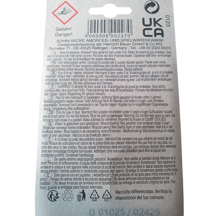 Verpackung der Wicke Euro Caps mit vier roten Rollen sowie drei zusätzliche abgewickelte Rollen mit sichtbaren Zündplättchen.