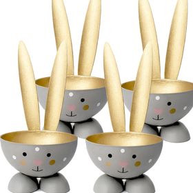 Vier graue Hasen-Eierbecher mit goldenen Ohren auf weißem Hintergrund; unten rechts befindet sich ein runder Hinweis mit der Aufschrift „4 Stück“.