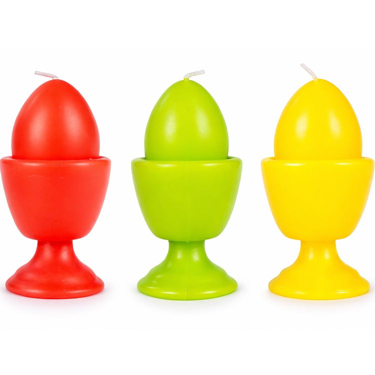 Osterkerzen 3er-Set bunt im Eierbecher Tischdeko Ostern Drei bunte Kerzen in Eierform mit integriertem Eierbecher-Design in Rot, Grün und Gelb vor weißem Hintergrund.