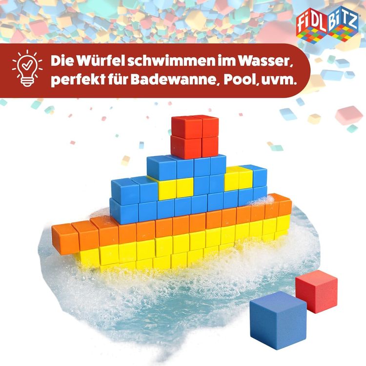 184 Selbstklebende Würfel Kreatives Motorik- & Konstruktionsspielzeug für Kinder Transparenter Kunststoff-Eimer mit rotem Deckel und Tragegriff, gefüllt mit etwa 184 bunten FIDL BITZ Bauwürfeln (ca. 2 × 2 cm). Die selbstklebenden Würfel lassen sich ohne Kleber zusammendrücken und ermöglichen kreatives Bauen.