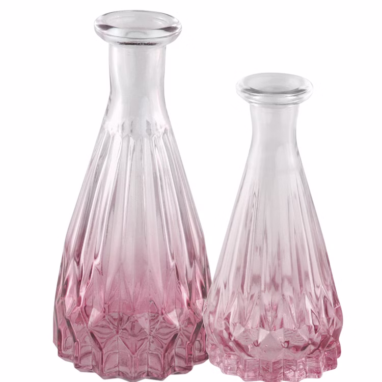 Glasvase Alexandrin Blumenvase 14,5 cm Deko-Vase mit Farbverlauf Rosa Tisch-Deko Geburtstag Hochzeit Wohnaccessoire Wohnen & Möbel Kleine Blumenvase Rosa Glasvasen Alexandrin im Größenvergleich mit der kleinen und der größeren Variante im gleichen Design.