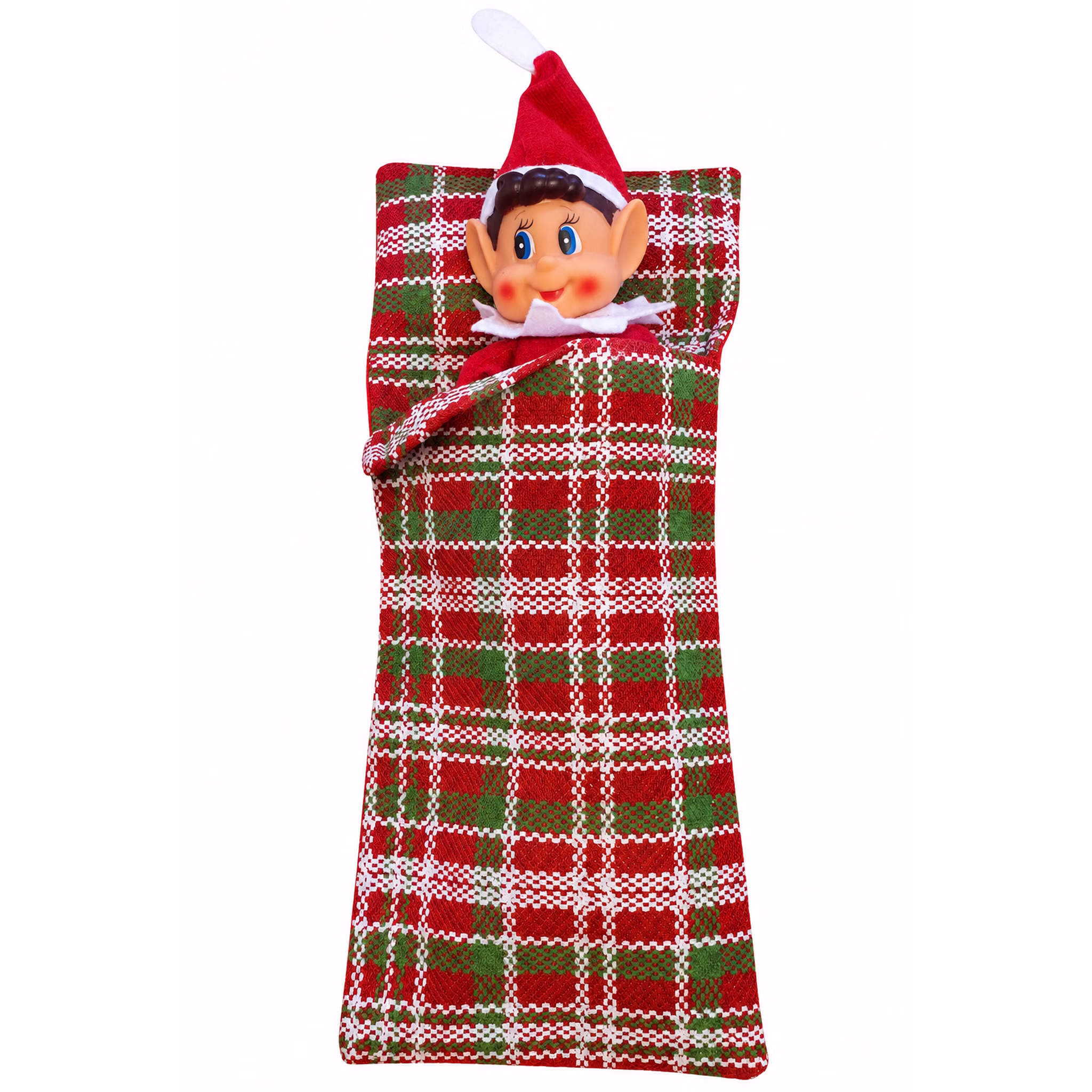 Wichtel gemütlich eingekuschelt Weihnachtswichteljunge mit roter Zipfelmütze liegt eingekuschelt im rot grün weiß karierten Schlafsack vor weißem Hintergrund.